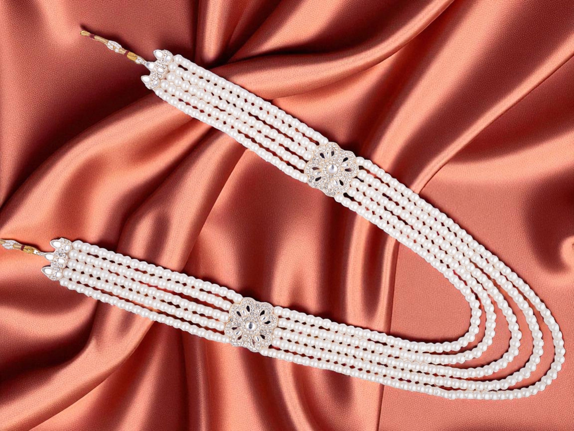 classic beaded groom’s mala with floral motifs white