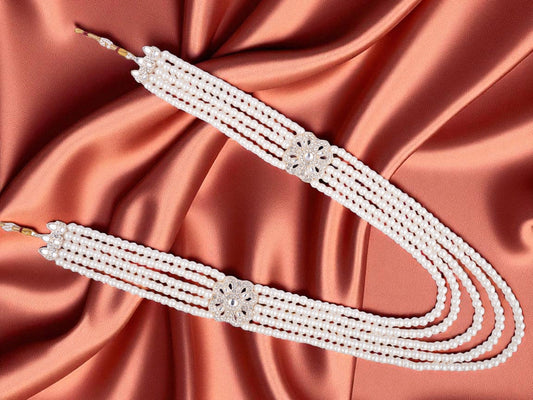 classic beaded groom’s mala with floral motifs white