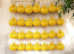 Bandhani Style Round Potli Bag with Golden Handle - Yellow