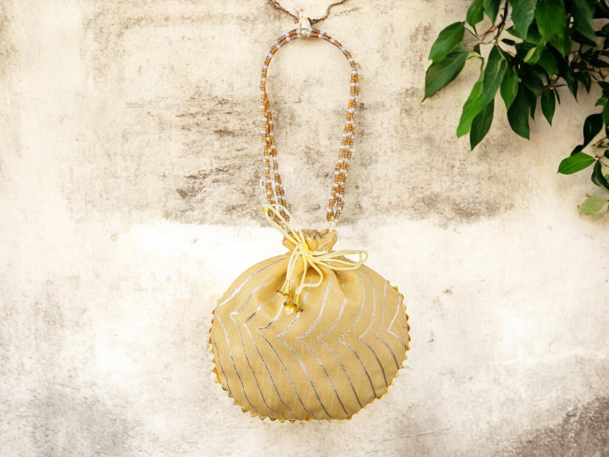 Bandhani Style Round Potli Bag with Golden Handle - Beige - Image 1