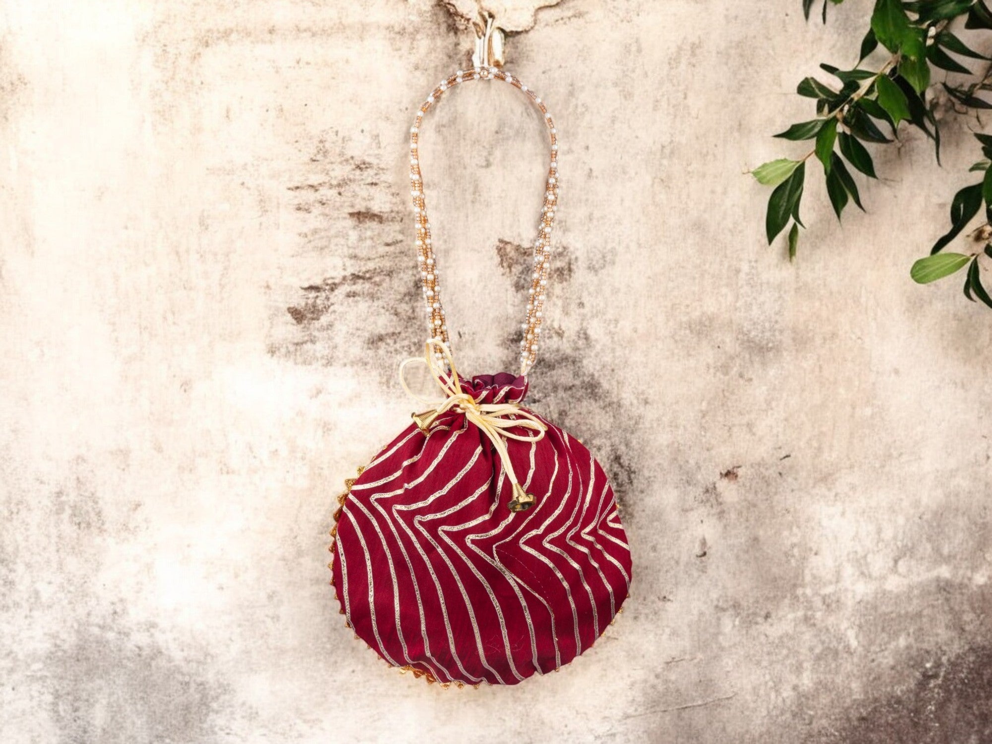 Bandhani Style Round Potli Bag with Golden Handle - Maroon - Image 1