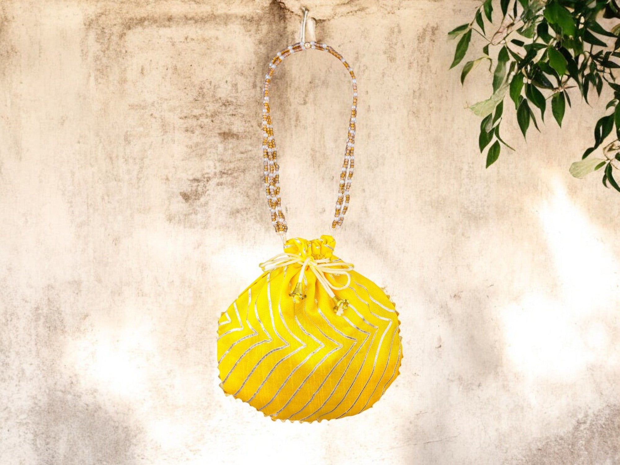 Bandhani Style Round Potli Bag with Golden Handle - Yellow - Image 1